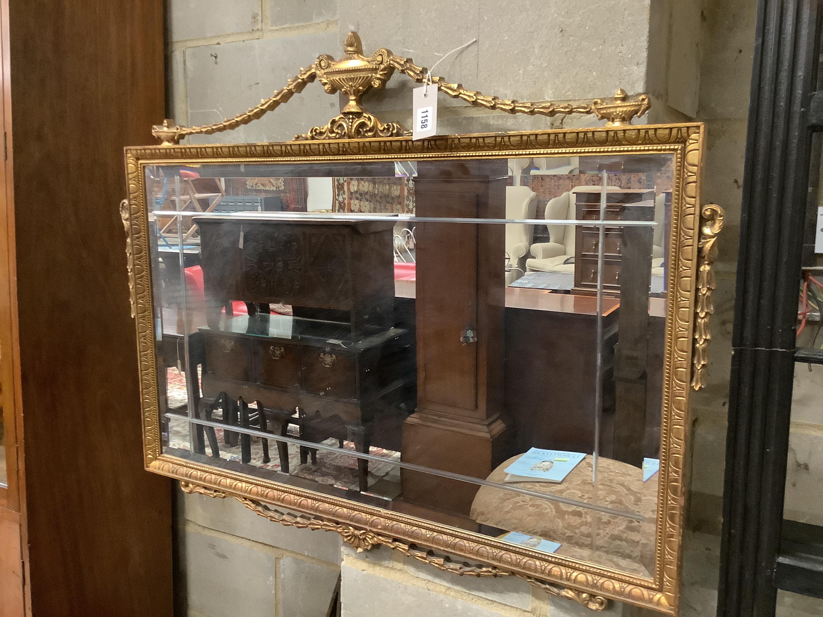 An Adam style gilt composition rectangular wall mirror width 98cm height 76cm.